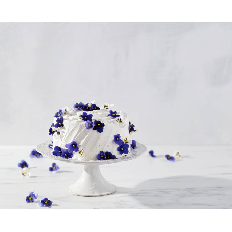 Elegant White Ceramic Pedestal Cake Stand with Floral Motif