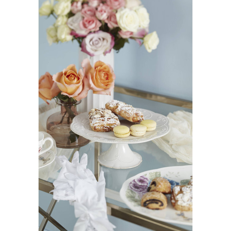 Elegant White Ceramic Pedestal Cake Stand with Floral Motif