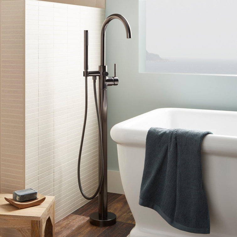Lexia Modern Black Metal Floor Mounted Bathtub Faucet with Hand Shower