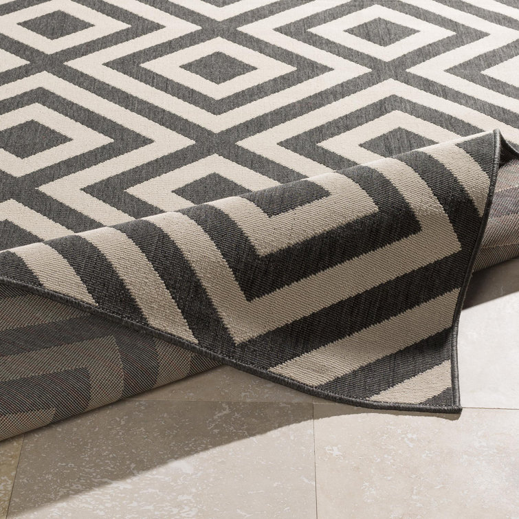 Awena 6' x 9' Gray and Beige Geometric Synthetic Area Rug