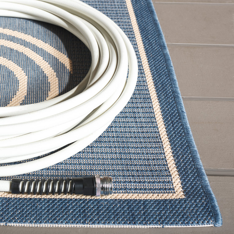 Rectangular 5' x 7' Blue and Natural Cotton Synthetic Rug