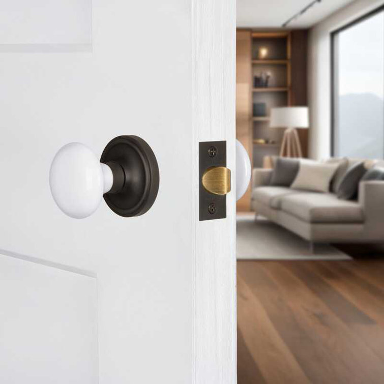 Classic White Porcelain Door Knob with Oil Rubbed Bronze Rosette