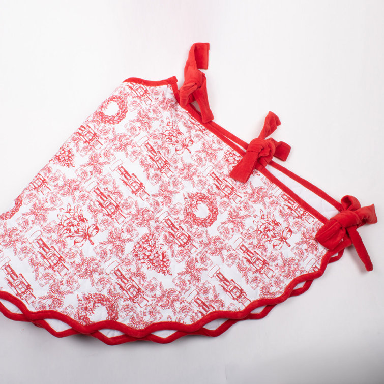 Red and White Cotton Nutcracker Tree Skirt with Velvet Bows