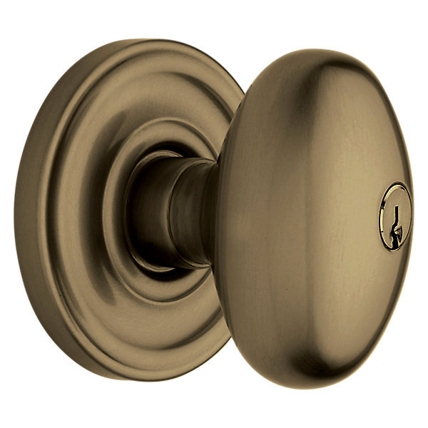 Antique Brass Egg Knob Entry Door Set with Round Rosette