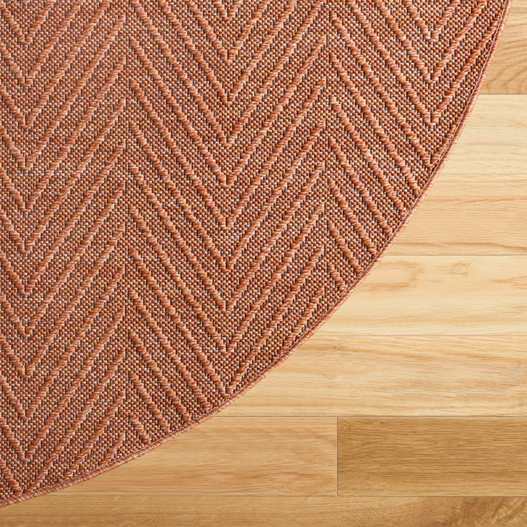 Pax Rust Herringbone Round Washable Area Rug