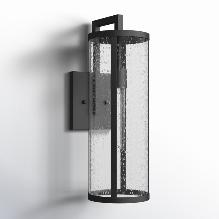 Medium Black Aluminum Cylinder Outdoor Wall Light with Seeded Glass