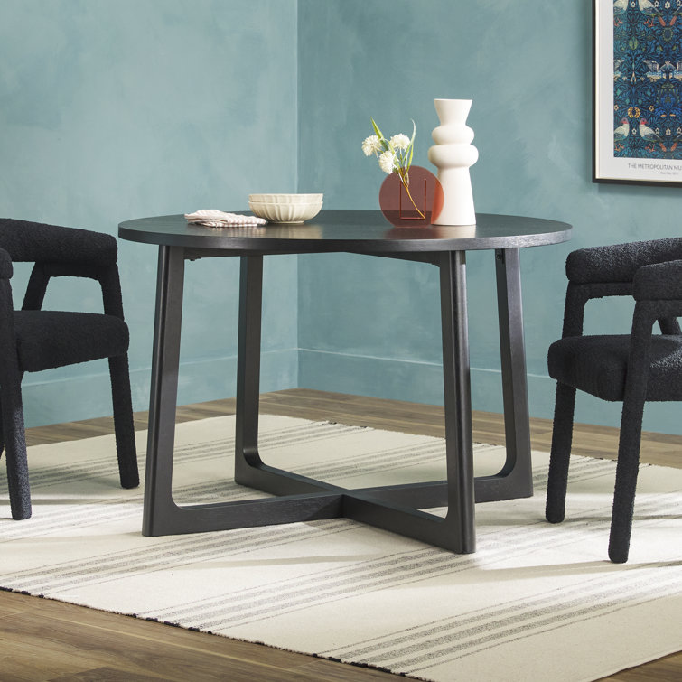 Black Solid Wood Round Dining Table with Geometric Legs