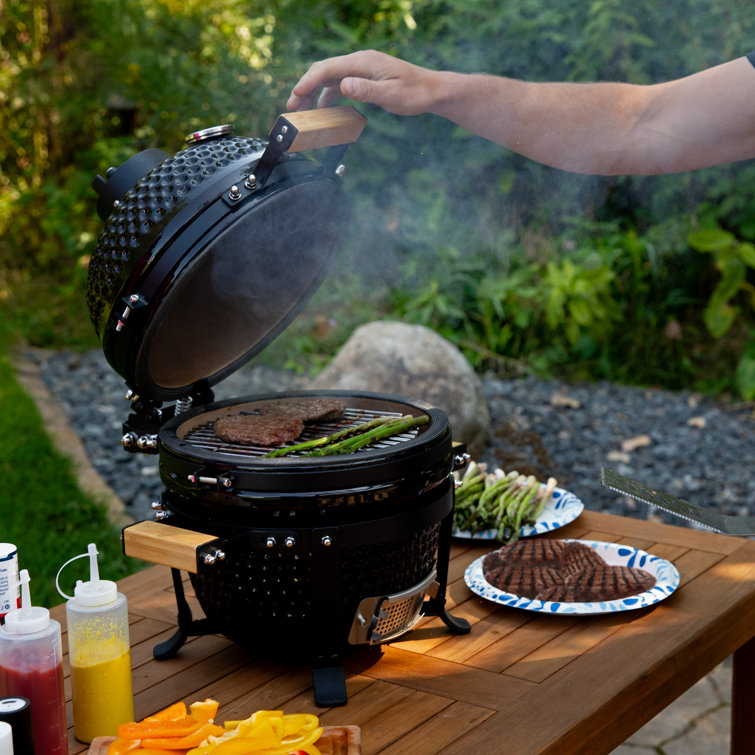 Compact Black Ceramic Kamado Grill with Smoker and Stand