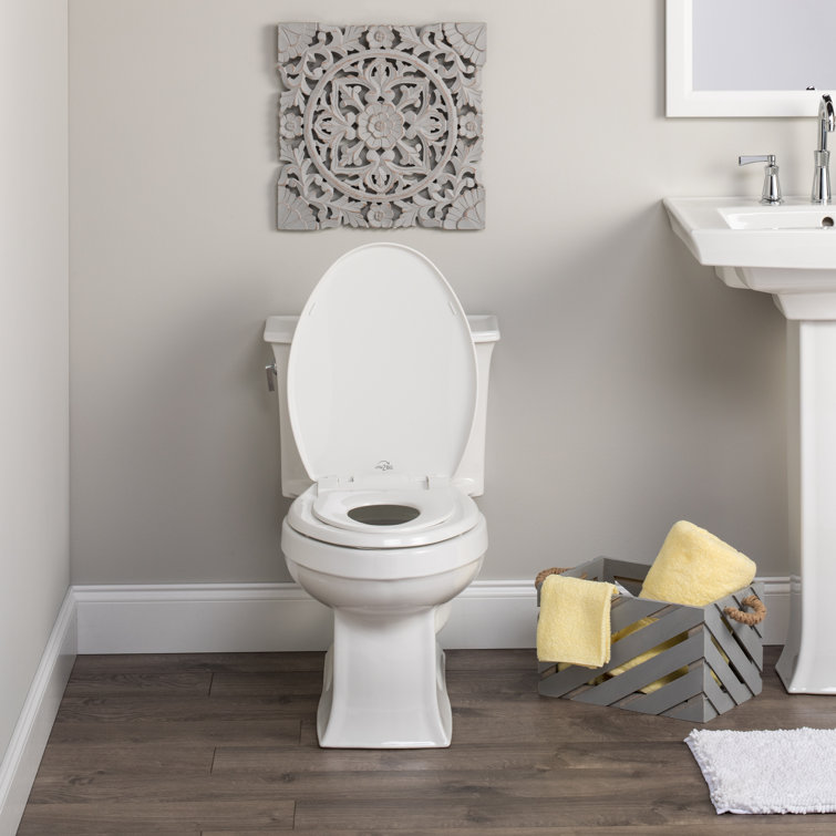 White Elongated Plastic Toilet Seat with Built-In Potty Training