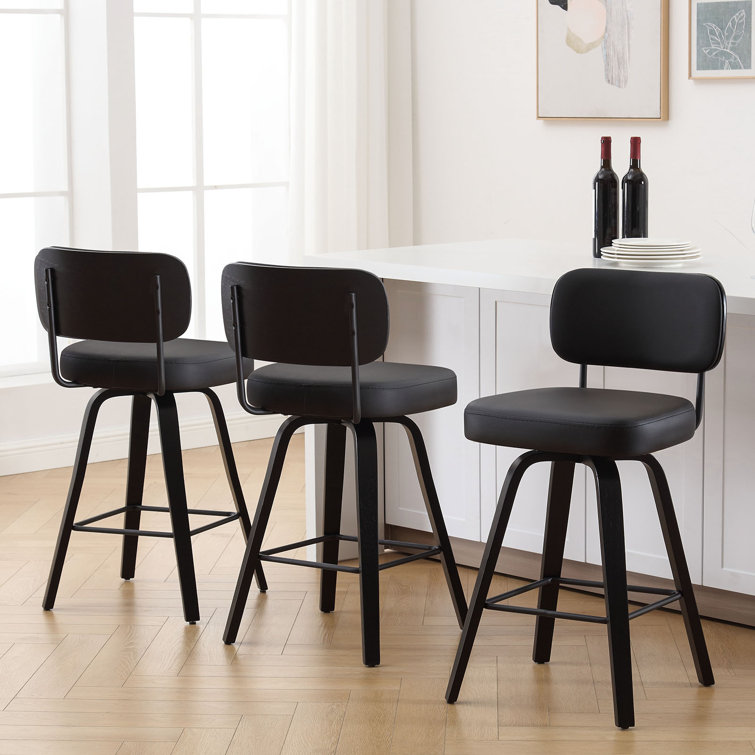 Black Swivel Upholstered Counter Stool with Wood Legs