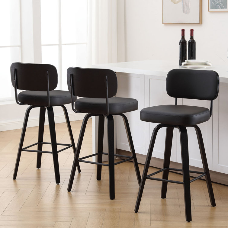 Black Swivel Upholstered Counter Stool with Wood Legs