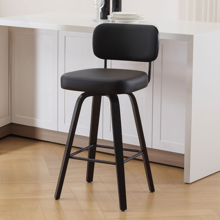 Black Swivel Upholstered Counter Stool with Wood Legs