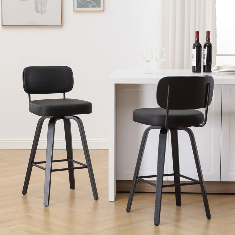Black Swivel Upholstered Counter Stool with Wood Legs