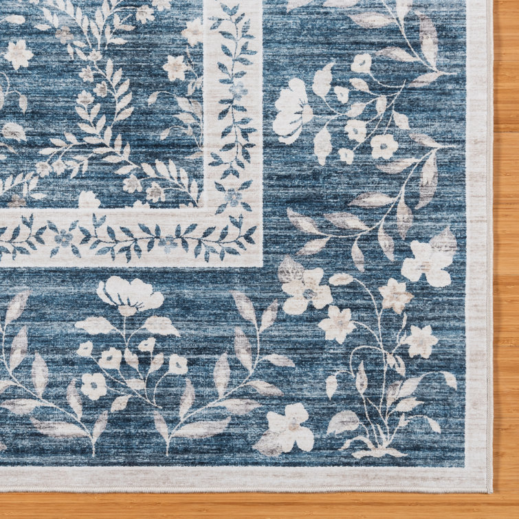 Vela Navy and Ivory Floral Print 8' x 10' Synthetic Area Rug