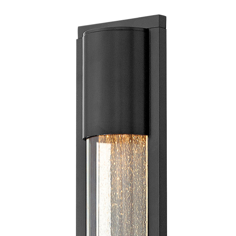 Sleek Satin Black Outdoor Wall Sconce with Seedy Glass