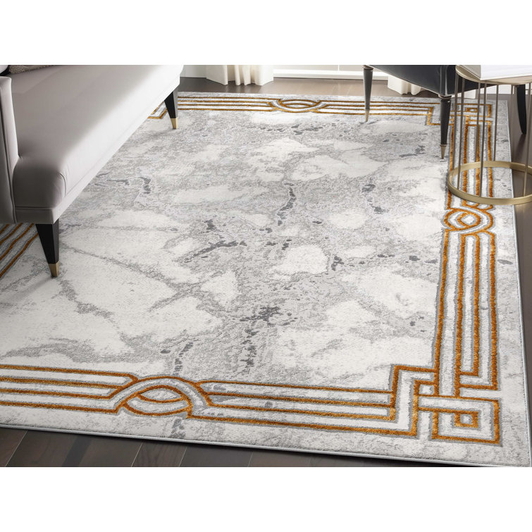Ivory and Gold Abstract Geometric Border Area Rug
