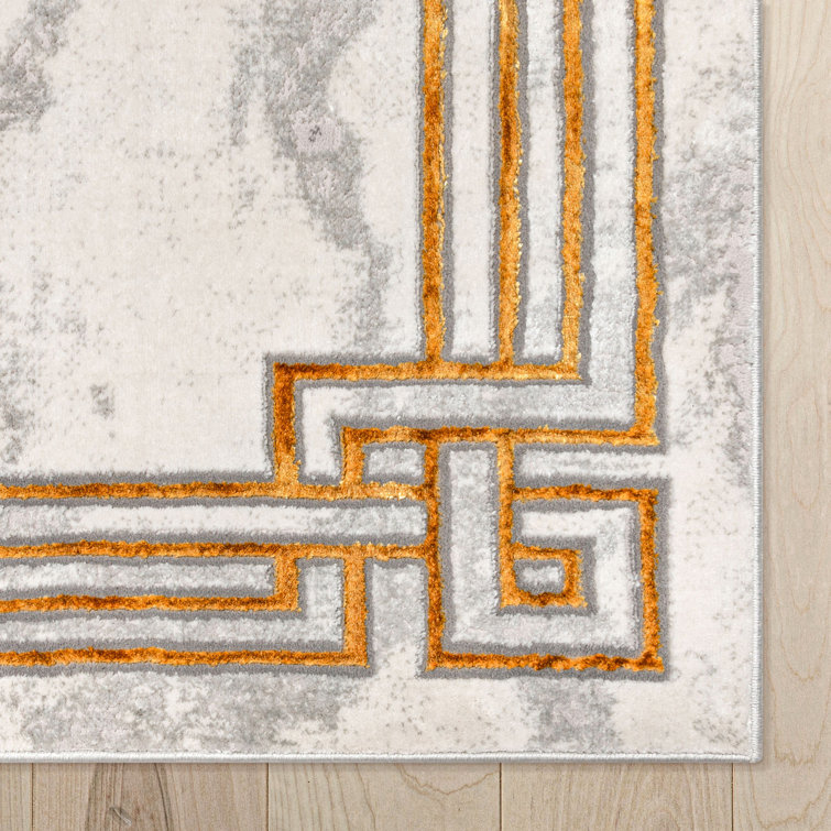 Ivory and Gold Abstract Geometric Border Area Rug