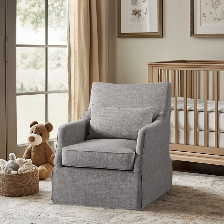 Gray Skirted Swivel Armchair with Lumbar Pillow