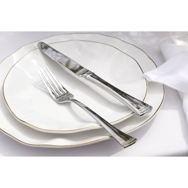 White and Blue Porcelain 12-Piece Dinnerware Set with Gold Rim