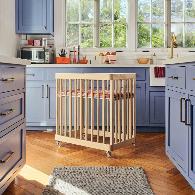 Blonde Pine Wood Convertible Crib with Rounded Spindles