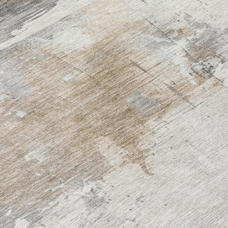 Ivory Abstract Synthetic 5' x 7' Washable Area Rug