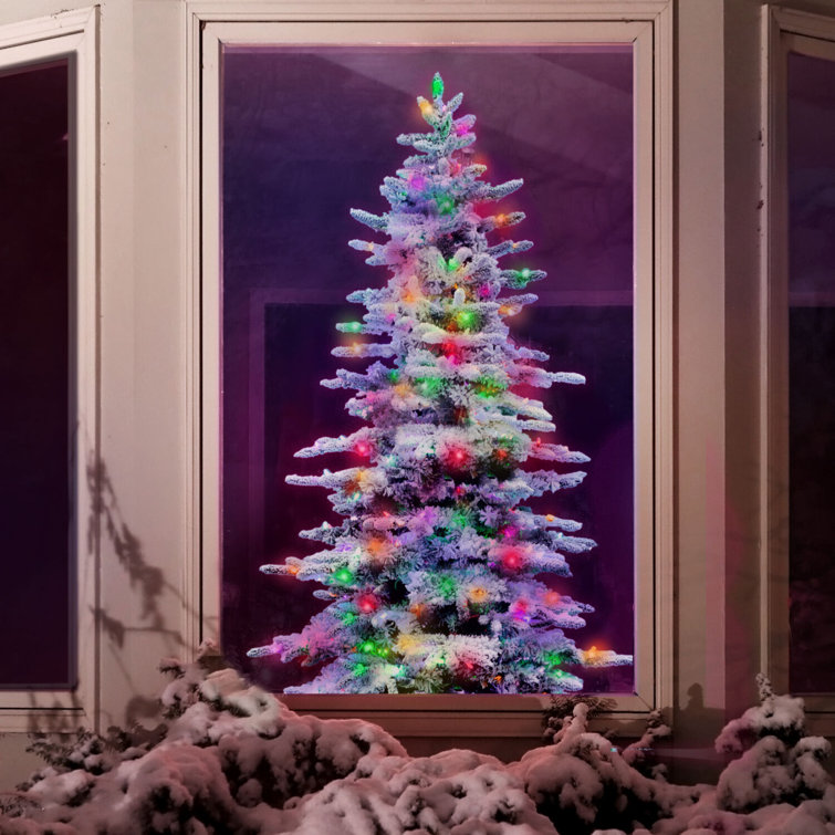 9-Foot Flocked Pine Christmas Tree with Multicolor LED Lights