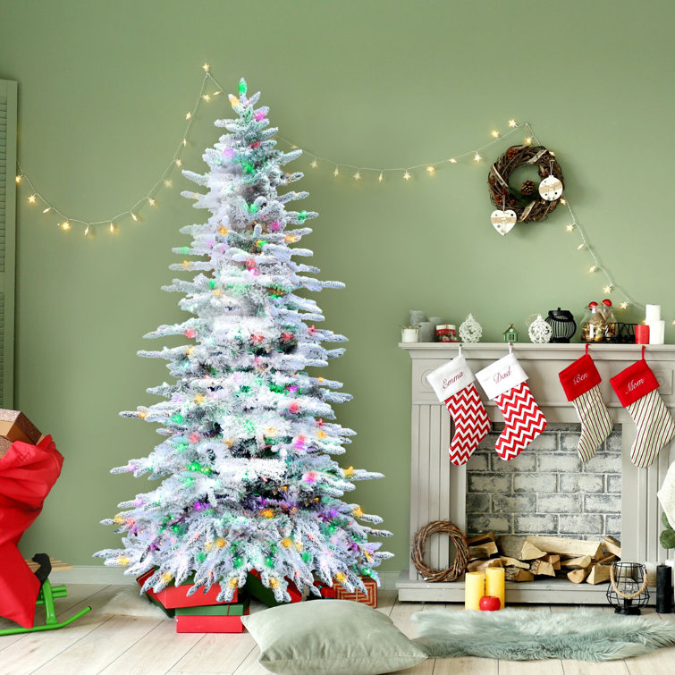 9-Foot Flocked Pine Christmas Tree with Multicolor LED Lights