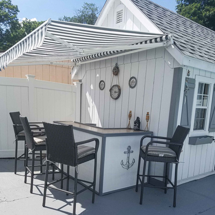 Grey and White Striped Retractable Patio Awning with White Frame
