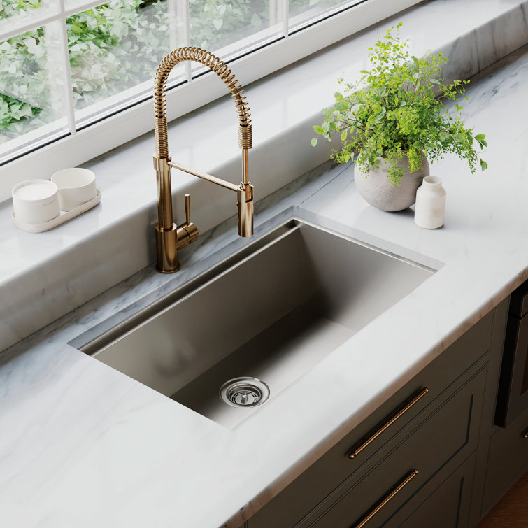 Champagne Bronze Spring-Loaded Kitchen Faucet with Spray Wand