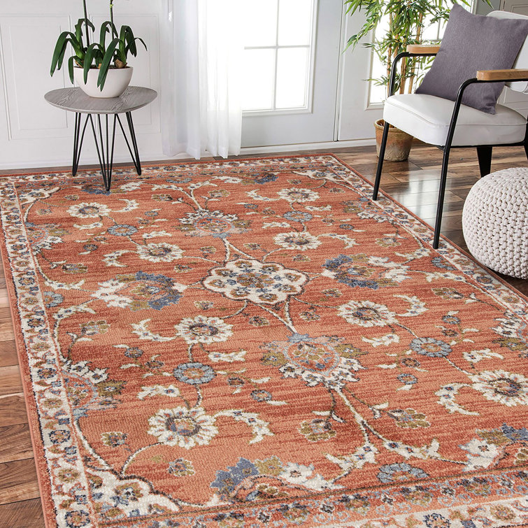Ivory and Orange Floral Rectangular Synthetic Area Rug