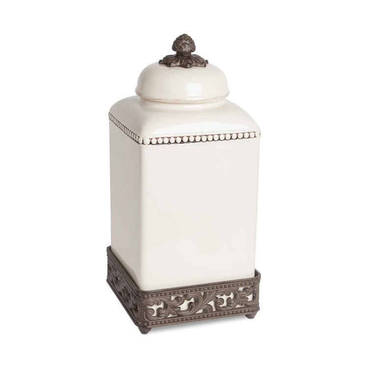Elegant Cream Ceramic Canister with Ornate Metal Base