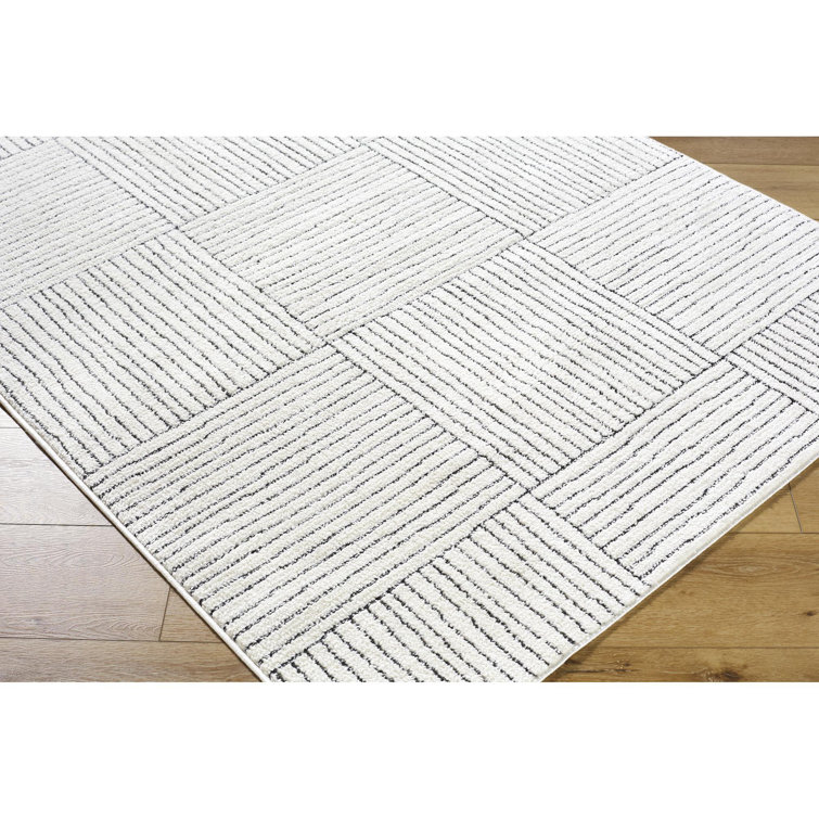 Ivory and Black Rectangular Synthetic Area Rug, 8' x 10'