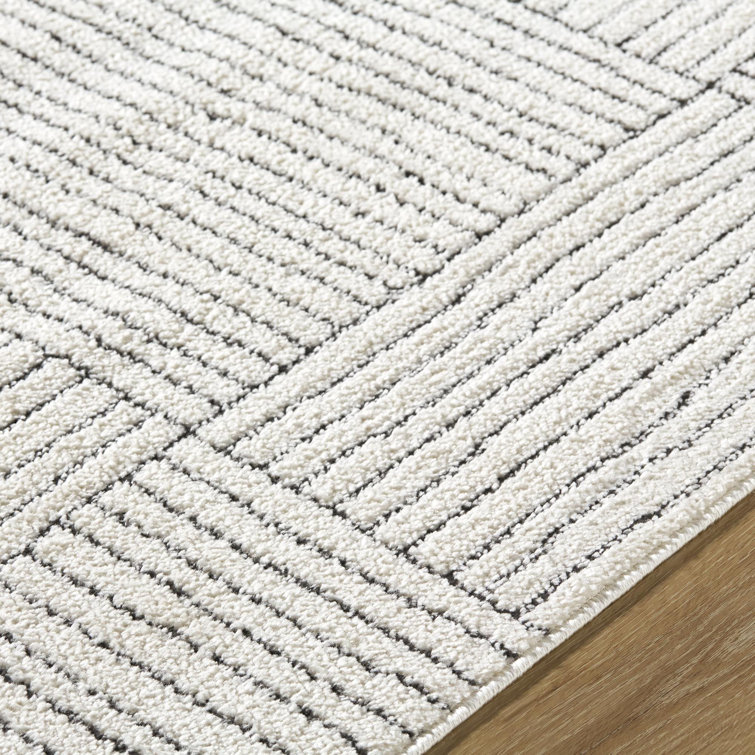 Ivory and Black Rectangular Synthetic Area Rug, 8' x 10'