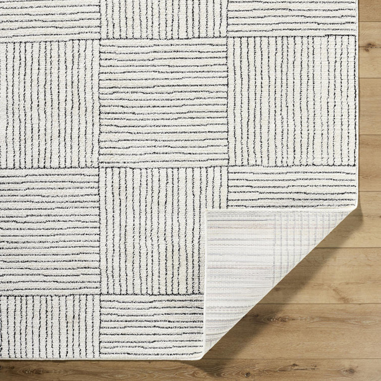 Ivory and Black Rectangular Synthetic Area Rug, 8' x 10'