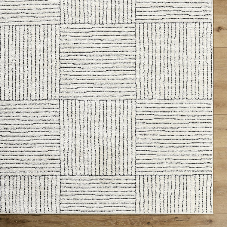 Ivory and Black Rectangular Synthetic Area Rug, 8' x 10'