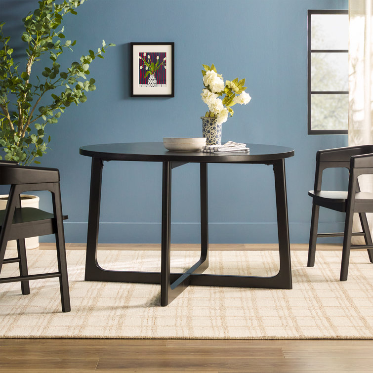 Black Solid Wood Round Dining Table with Geometric Legs