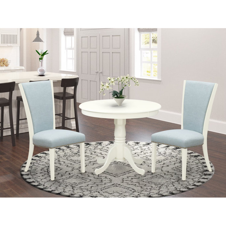 Linen White Round Pedestal Table with Baby Blue Fabric Chairs