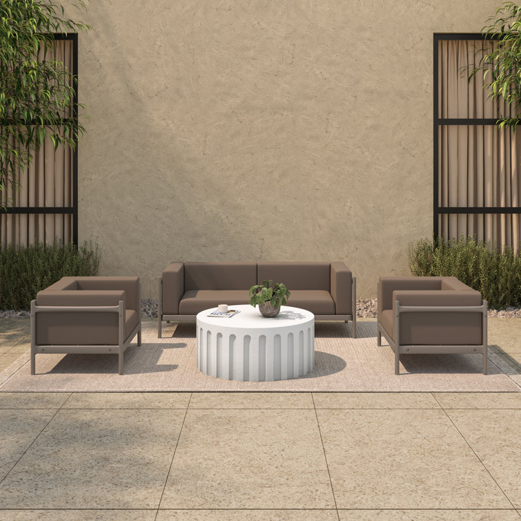 White Round Concrete Outdoor Coffee Table with Fluted Design