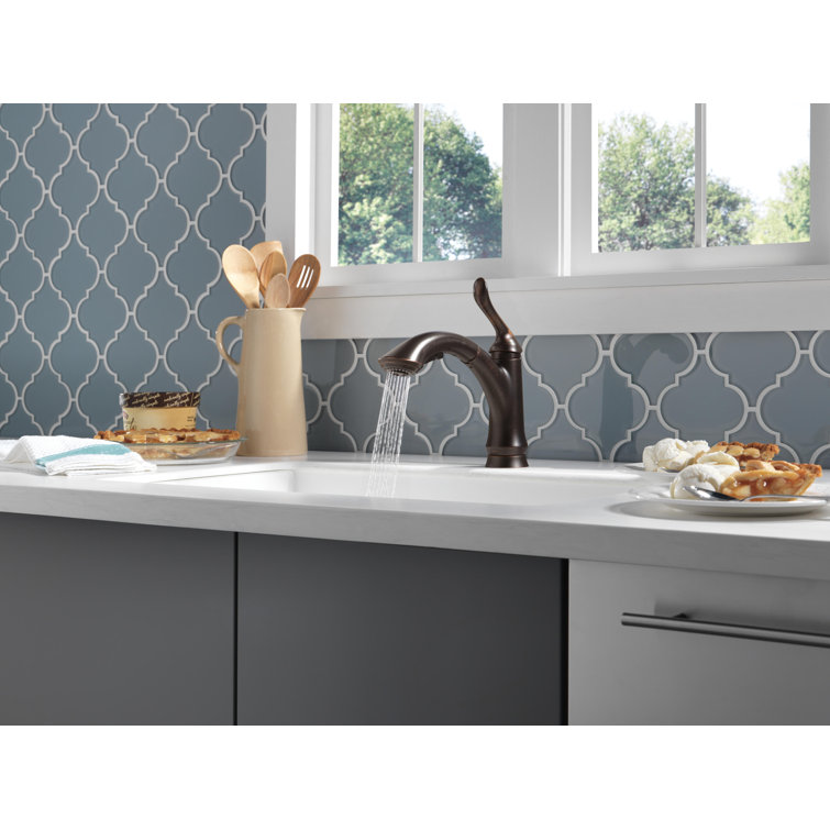 Venetian Bronze Single Handle Pull-Out Kitchen Faucet with Multi-Flow Spray