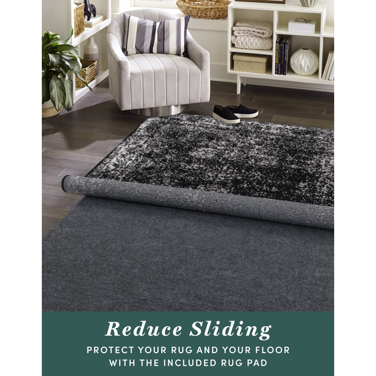 Brandt Black Floral Synthetic Octagon Area Rug
