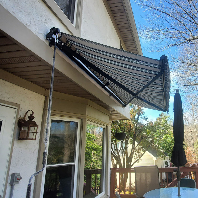 Gray and White Striped Retractable Patio Awning with Black Frame
