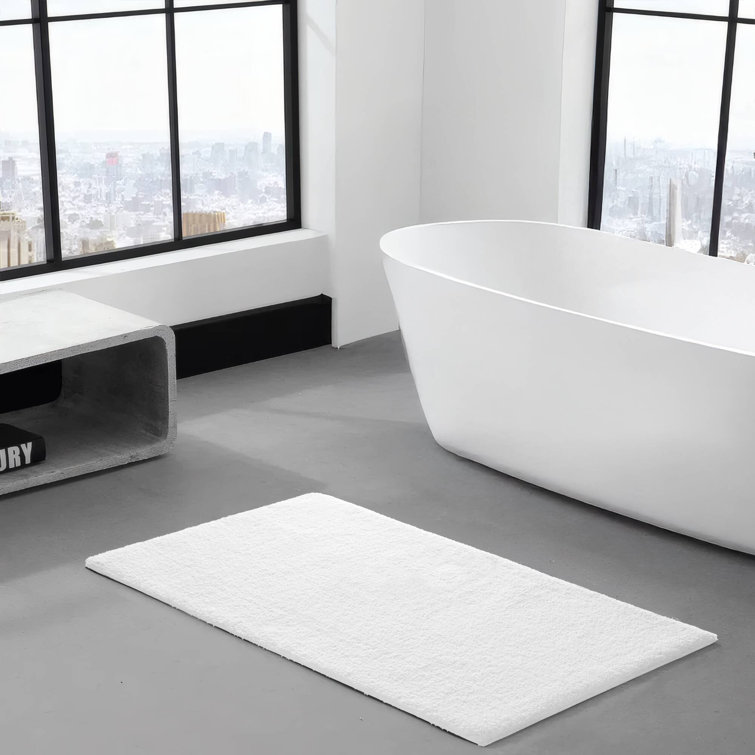 Luxurious Marshmallow White 24" x 40" Tufted Microfiber Bath Rug