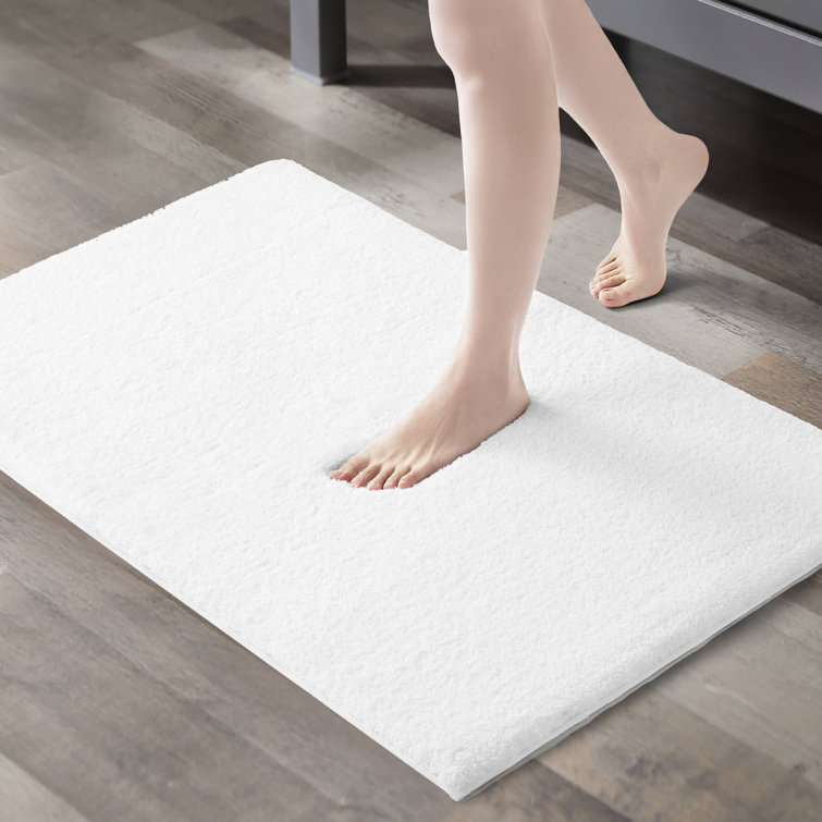 Luxurious Marshmallow White 24" x 40" Tufted Microfiber Bath Rug