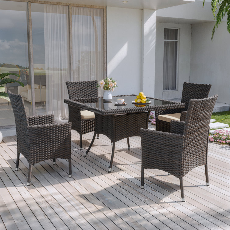 5-Piece Dark Brown Rattan Outdoor Dining Set with Sand Cushions and Glass Tabletop