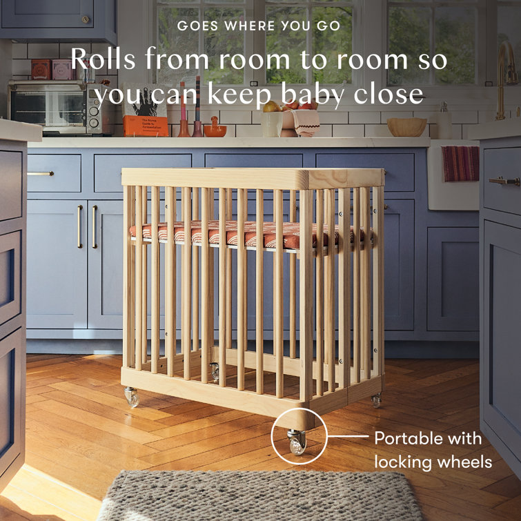 Blonde Pine Wood Convertible Crib with Rounded Spindles