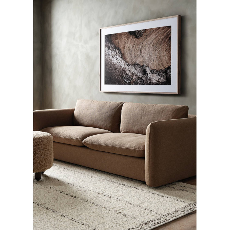 Aniston 22.5'' Ivory Sheepskin Round Ottoman with Wire-Brushed Legs