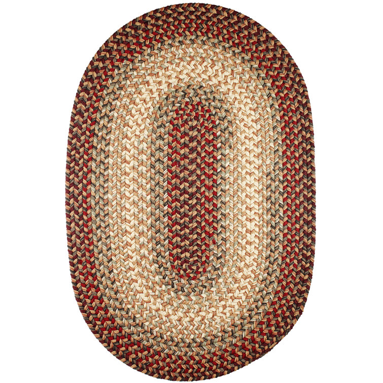 Handmade Oval Red and Beige Synthetic Braided Rug
