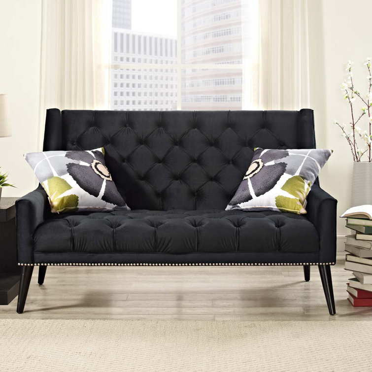 Elegant Black Velvet Tufted Loveseat with Nailhead Detail and Flared Arms