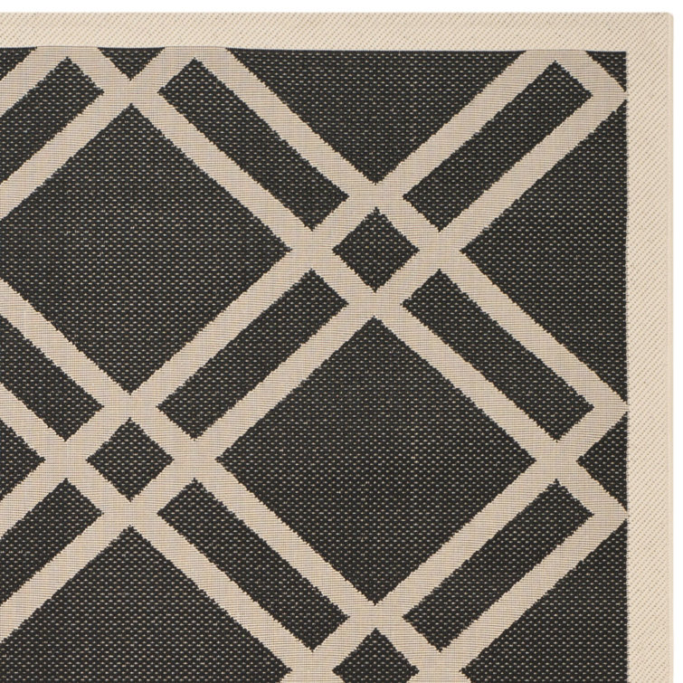 Safavieh Courtyard 5'3" x 7'7" Black and Beige Synthetic Area Rug