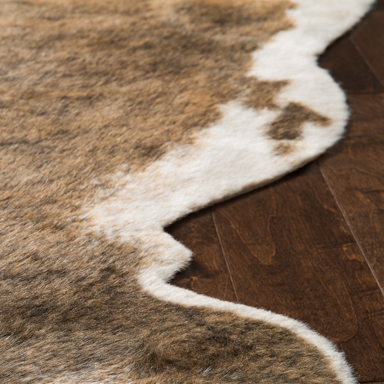 Beige and Brown Faux Cowhide Stain-Resistant Rug